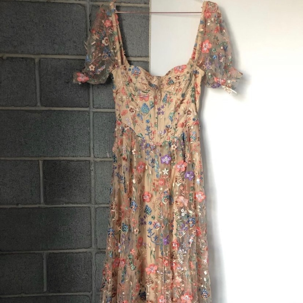 Beautifully embroidered floral dress.